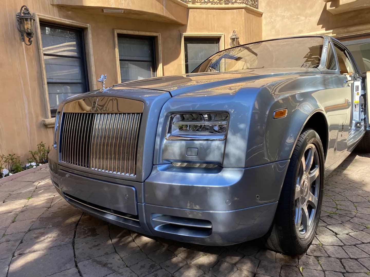 Rolls-Royce Phantom freshly detailed in a client's driveway